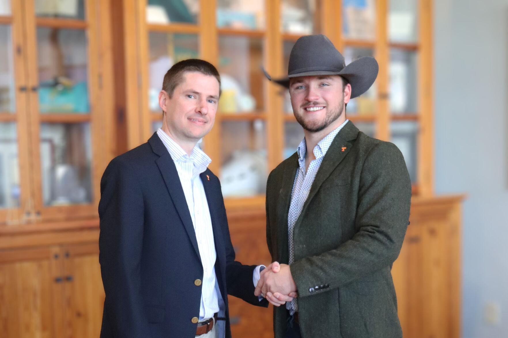 Christopher Stripling, ALEC department head, congratulates Samuel Monarch on his assistantship. Photo curtesy of Abraham Baldwin Community College